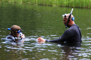Seth gets some snorkeling training from experienced diver and Northwest Passage counselor Peter Ducos, St. Croix River upstream from Danbury, WI.