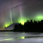 Northern Lights shine above Eagle Lake north of Duluth in March 2015. Bob King